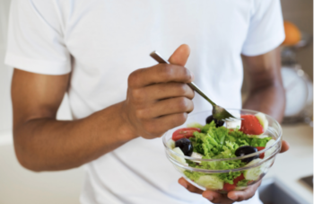 Man Eating Salad