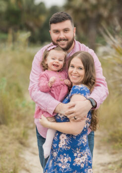 Nikki Kulovitz with her husband and daughter